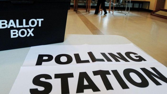 Polling station sign and a ballot box