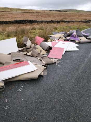 Ribble Valley council taxpayers will foot the bill after fly-tippers dumped two vanloads of carpet at Annel Cross near Downham.