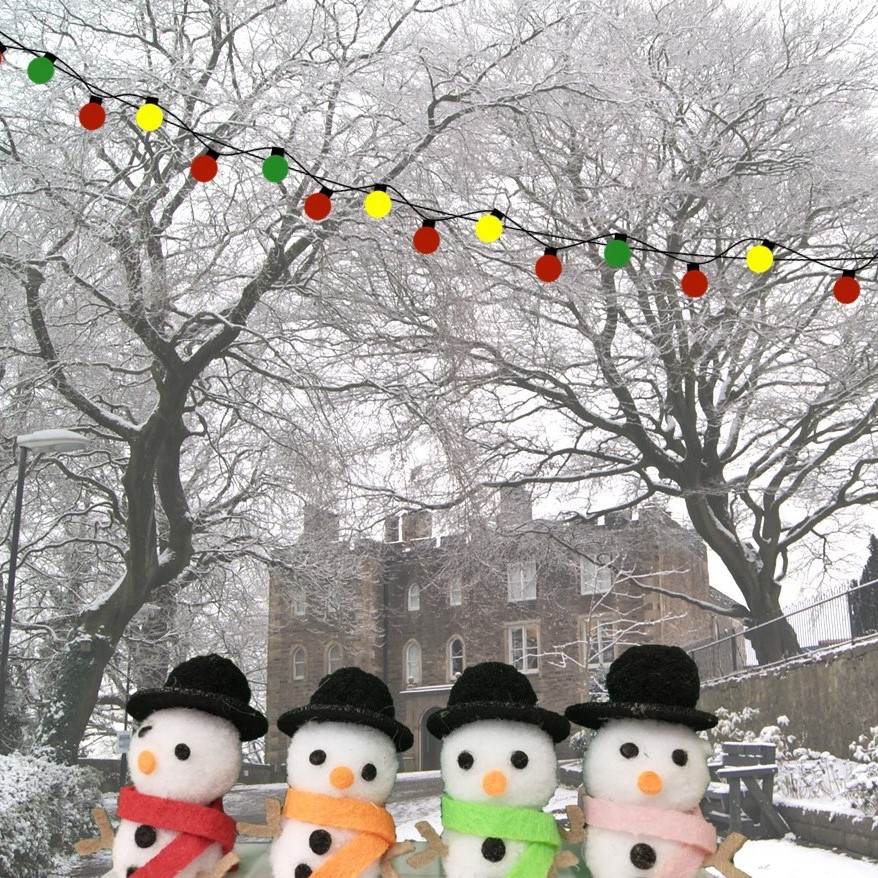 Snowmen sat outside Clitheroe Castle Museum