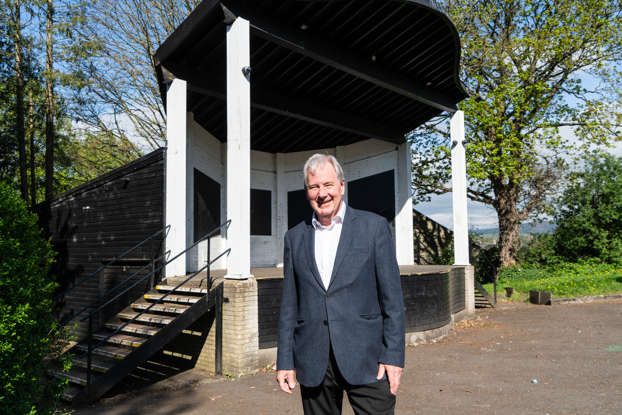 Councillor Stuart Hirst stood in front of the old bandstand