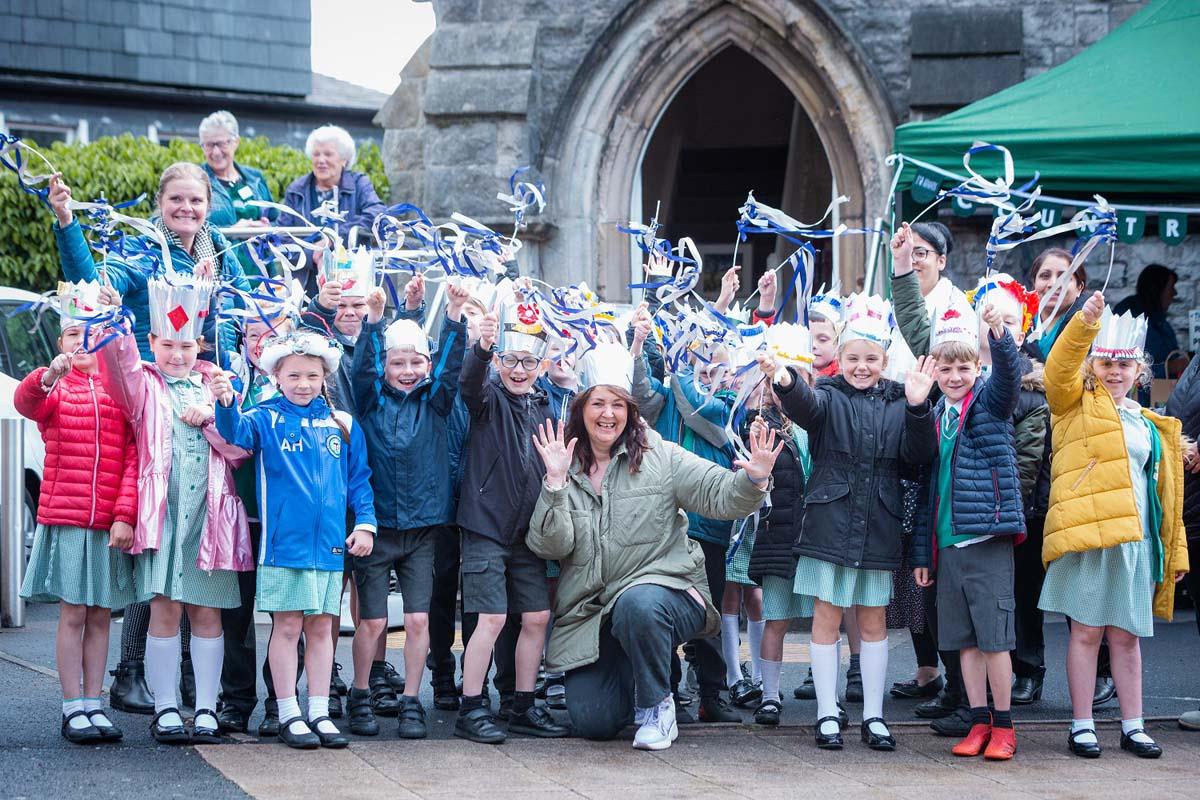 Children at St Michael and St John's primary school waiting for the parade to start