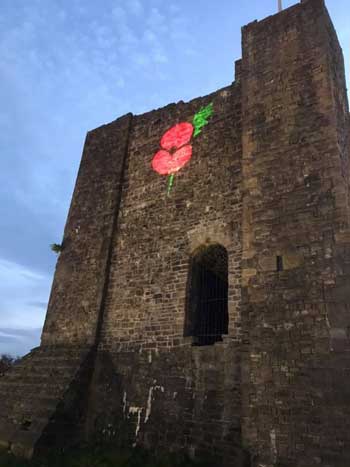 Poppy projected onto Clitheroe Castle