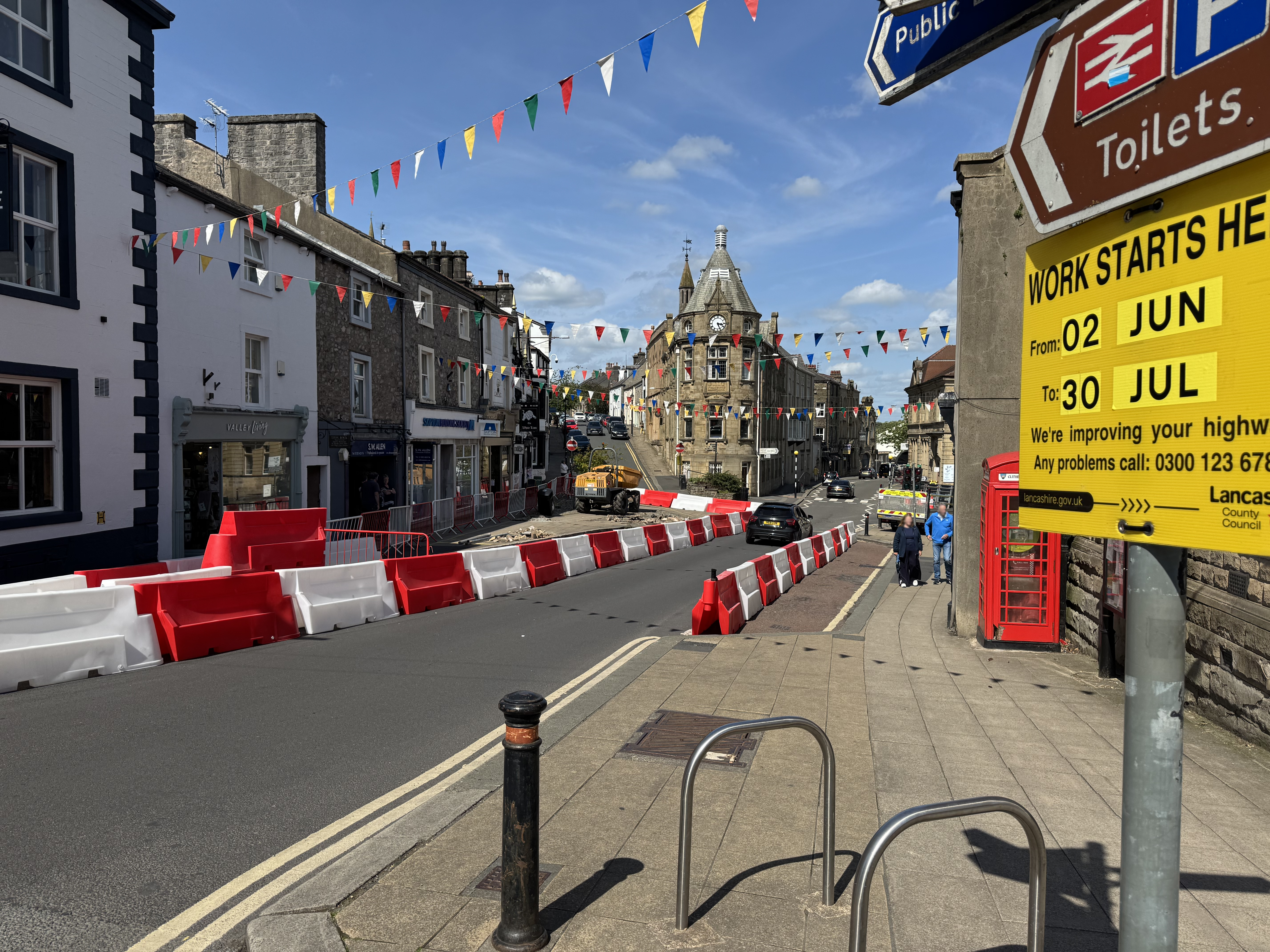 View of Market Place, Clitheroe. Shows start of improvement works with signage and barricades
