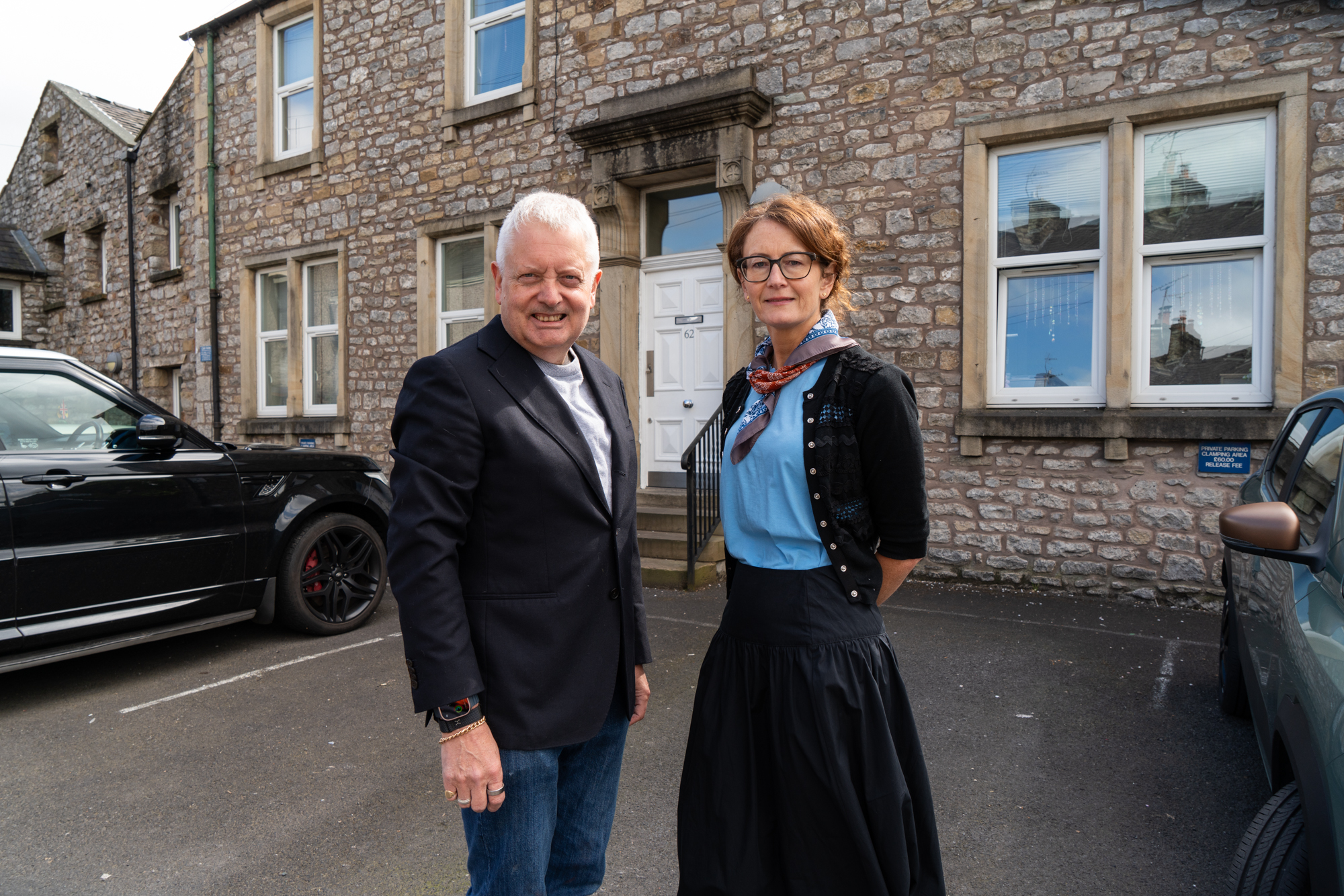 Mark Hindle, chairman of Ribble Valley Borough Council’s health and housing committee, and Rachael Stott, the council’s strategic housing manager stood outside Waterloo House, Clitheroe